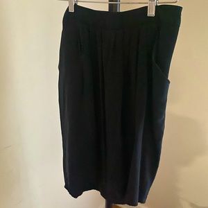 Black cotton midi skirt with pockets